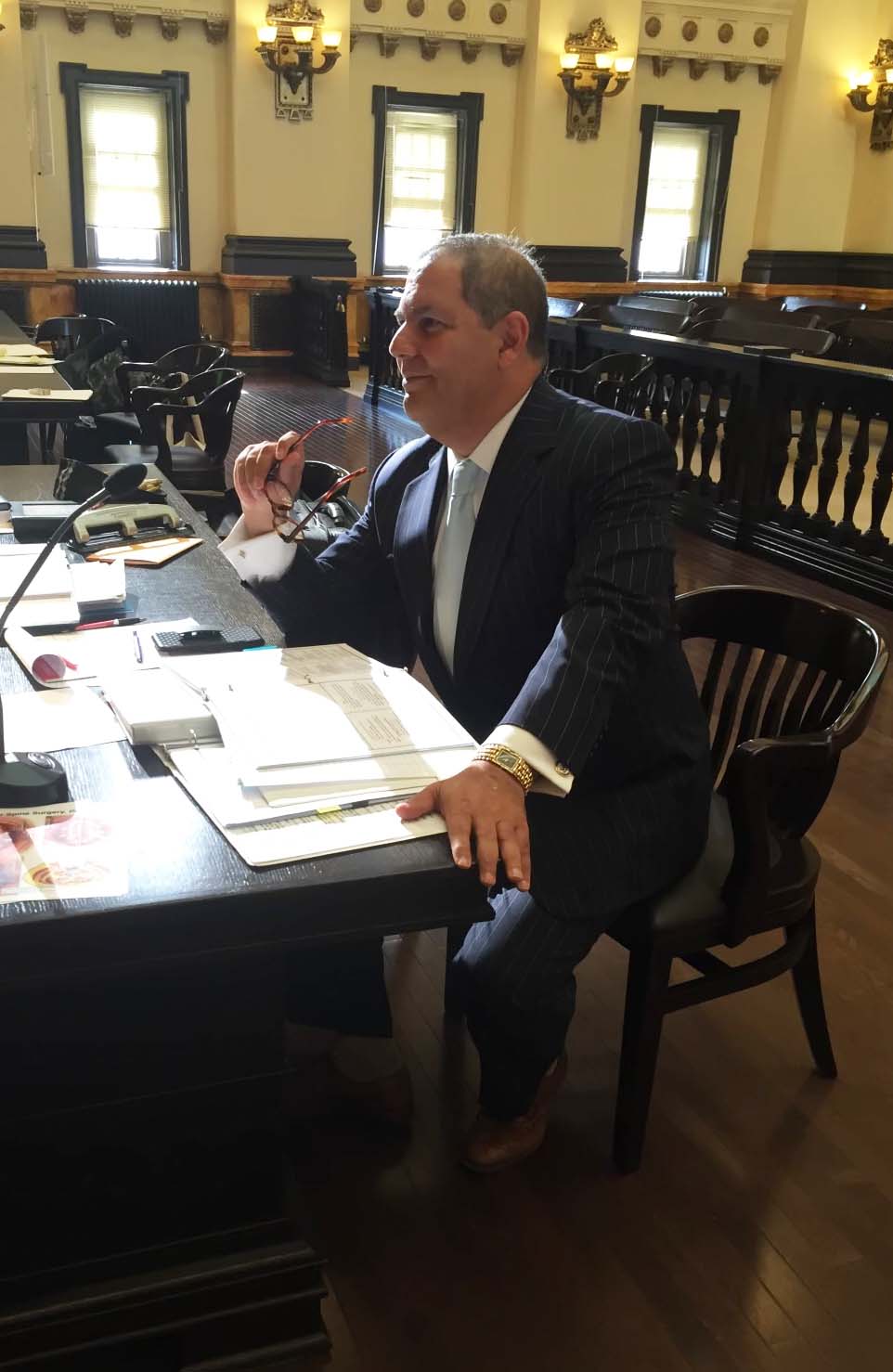 Robert Bellinson at desk